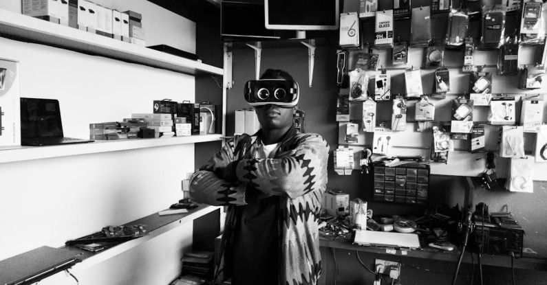 In-Store Experience - Black man in VR goggles in electronics store