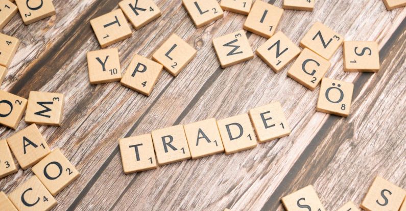 Trade Policies - Trade and trade related words on wooden table