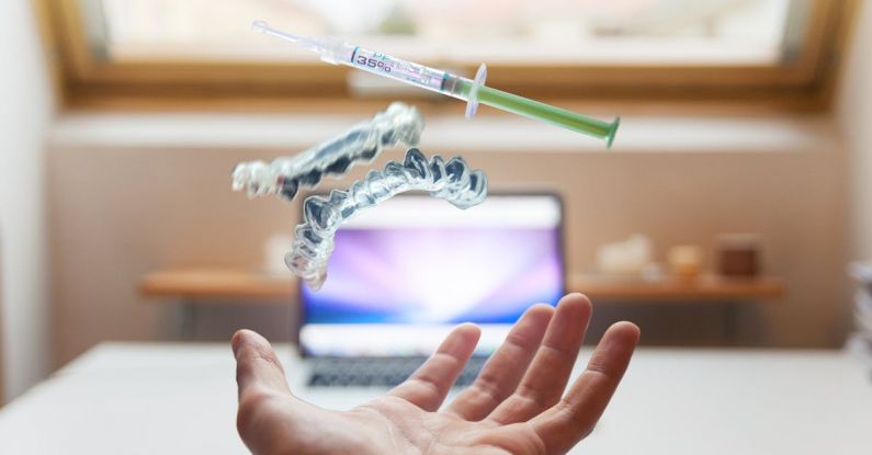 Medical Technology - Syringe Floating Near Person's Hand