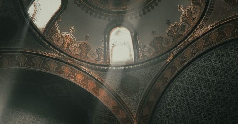 Attract Investors - From below dome inside of ancient Topkapi Palace located in Istanbul decorated with arches and golden ornaments