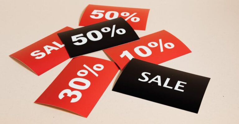 Interest Rates - Sale Cards on Beige Background